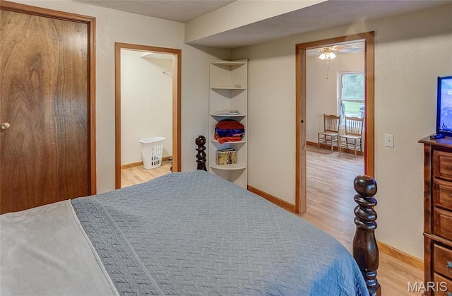 3448 Levee Rd, Centralia, IL 62801 - bedroom with light wood-style flooring and baseboards
