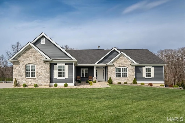 2181 Jarvis Rd, Foristell, MO 63348 - single story home featuring stone siding, a front yard, a porch, and roof with shingles