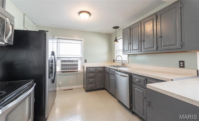 11 Rolla Gardens Dr, Rolla, MO 65401 - kitchen featuring a sink, stainless steel appliances, gray cabinets, light floors, and light countertops
