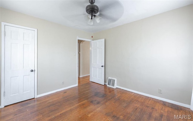 11 Rolla Gardens Dr, Rolla, MO 65401 - unfurnished bedroom featuring baseboards, wood finished floors, and a ceiling fan