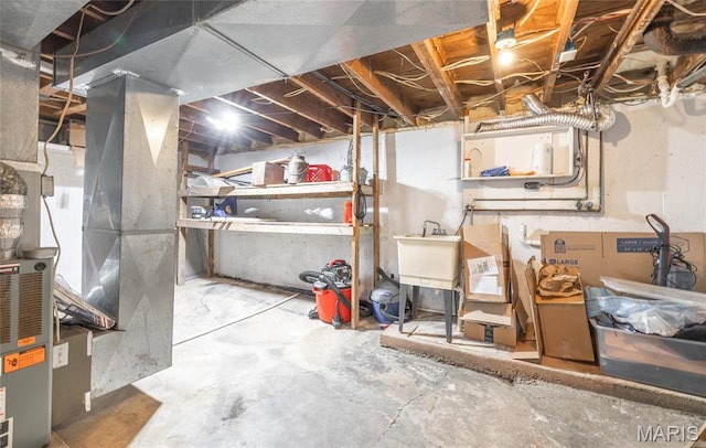 11 Rolla Gardens Dr, Rolla, MO 65401 - unfinished below grade area featuring a sink