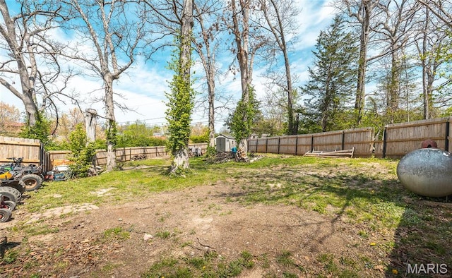 11 Rolla Gardens Dr, Rolla, MO 65401 - fenced backyard with a shed and an outdoor structure
