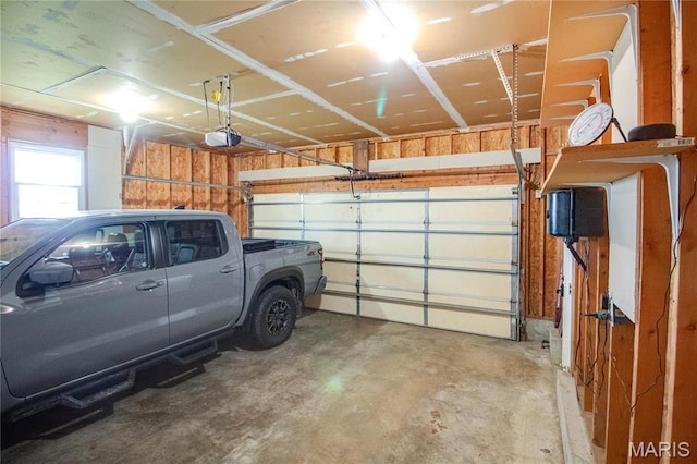 garage featuring a garage door opener