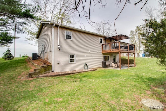 back of house with a patio, a deck, a lawn, and central air condition unit