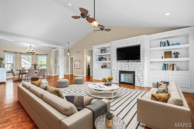 2 Arthurs Ct, Troy, IL 62294 - living area with wood finished floors, a chandelier, a ceiling fan, vaulted ceiling, and recessed lighting