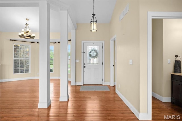 2 Arthurs Ct, Troy, IL 62294 - foyer with plenty of natural light, wood finished floors, a chandelier, and baseboards
