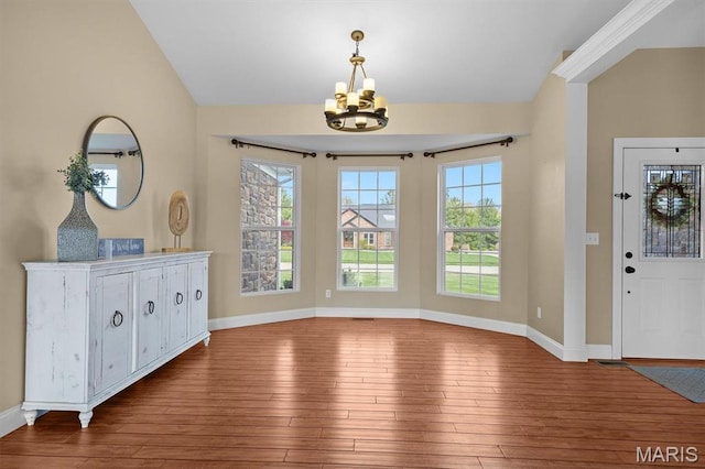 2 Arthurs Ct, Troy, IL 62294 - foyer entrance with a chandelier, wood-type flooring, and baseboards