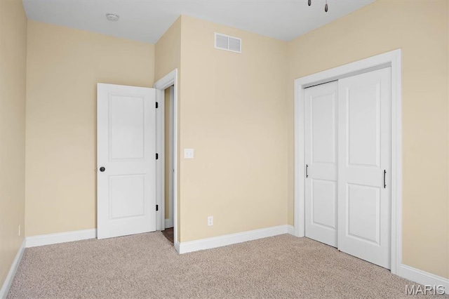 2 Arthurs Ct, Troy, IL 62294 - unfurnished bedroom with carpet, a closet, and baseboards
