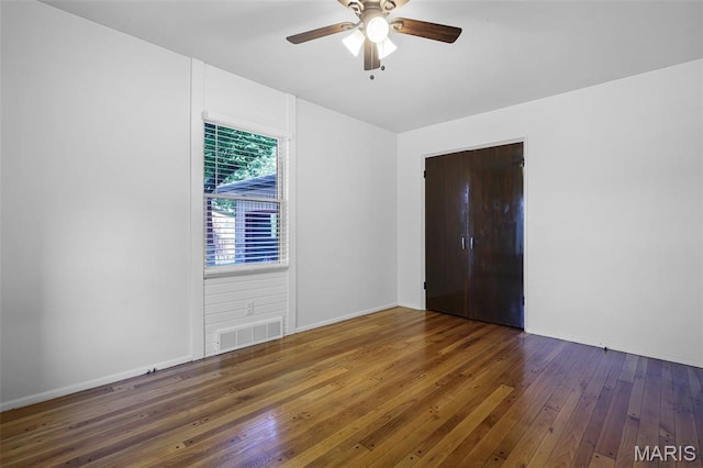 135 Hollyhock Ln, Edwardsville, IL 62025 - spare room with hardwood / wood-style floors, ceiling fan, and baseboards