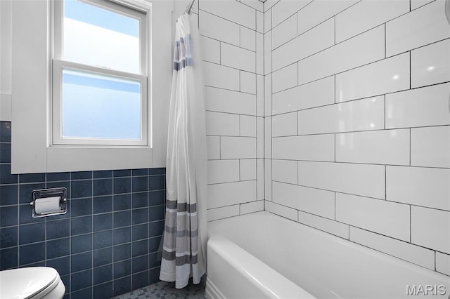 135 Hollyhock Ln, Edwardsville, IL 62025 - full bathroom with tile walls, toilet, shower / tub combo, and wainscoting