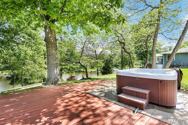 135 Hollyhock Ln, Edwardsville, IL 62025 - wooden terrace featuring a hot tub and a water view