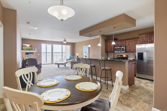 18011 Blue Anchor Dr Unit 132, Gravois Mills, MO 65037 - dining area with a ceiling fan