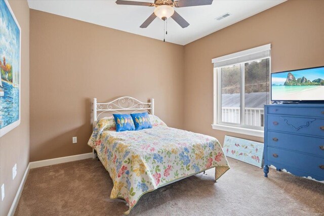18011 Blue Anchor Dr Unit 132, Gravois Mills, MO 65037 - carpeted bedroom with a ceiling fan and baseboards