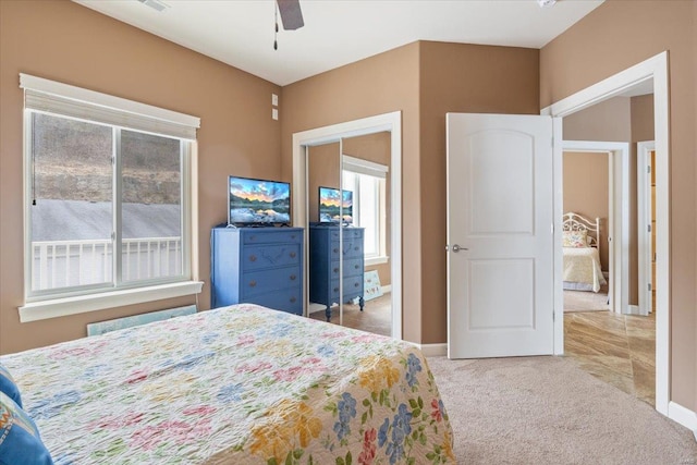 18011 Blue Anchor Dr Unit 132, Gravois Mills, MO 65037 - bedroom with carpet flooring, baseboards, and a ceiling fan