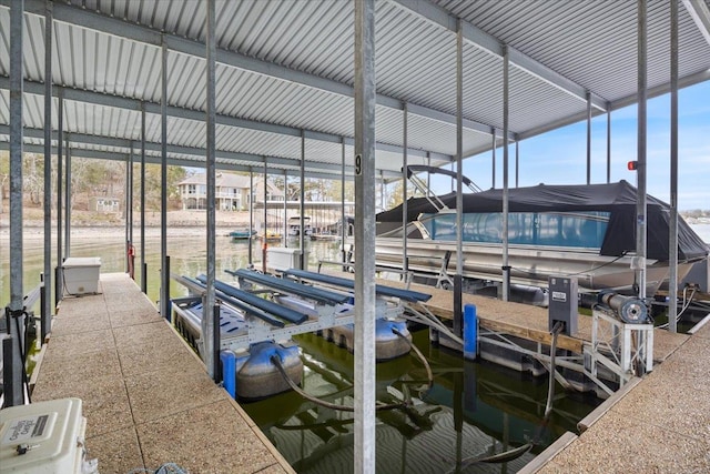 18011 Blue Anchor Dr Unit 132, Gravois Mills, MO 65037 - dock featuring boat lift and a water view