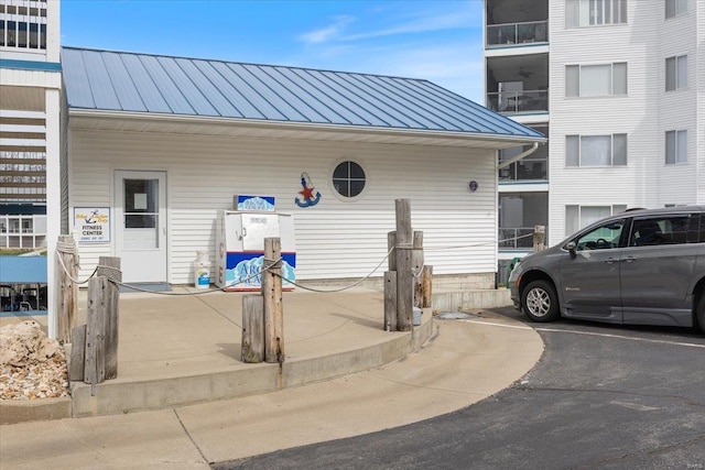 18011 Blue Anchor Dr Unit 132, Gravois Mills, MO 65037 - doorway to property with metal roof and a standing seam roof