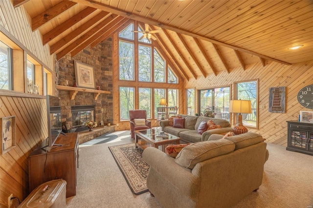 2099 Meadow Valley Dr, Innsbrook, MO 63390 - living room featuring carpet floors, healthy amount of natural light, wooden ceiling, beam ceiling, and wood walls