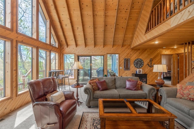 2099 Meadow Valley Dr, Innsbrook, MO 63390 - living room with wood walls, high vaulted ceiling, beam ceiling, and carpet floors