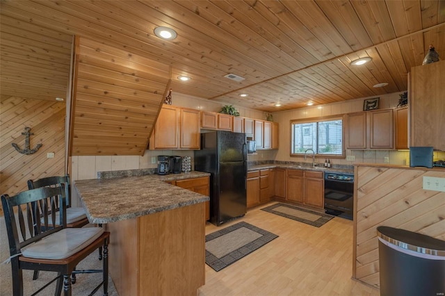 2099 Meadow Valley Dr, Innsbrook, MO 63390 - kitchen featuring black appliances, a peninsula, a sink, wood ceiling, and light wood finished floors
