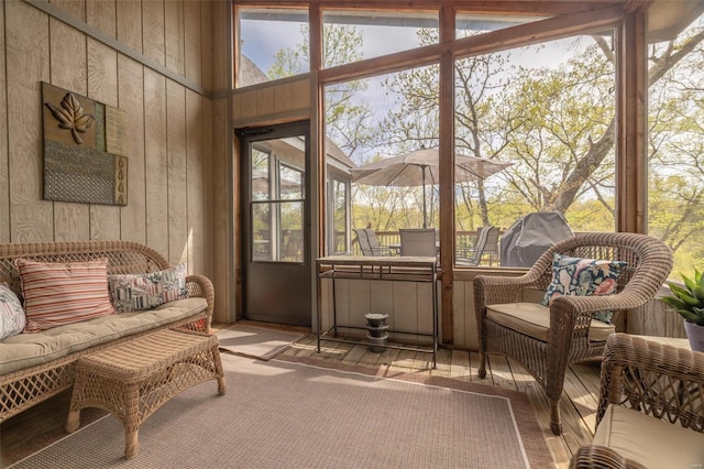 2099 Meadow Valley Dr, Innsbrook, MO 63390 - sunroom featuring wooden walls, wood finished floors, and plenty of natural light