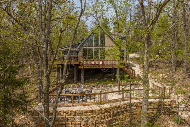 2099 Meadow Valley Dr, Innsbrook, MO 63390 - back of house featuring a wooden deck and stairway