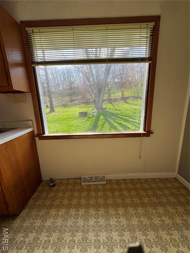 13899 Riverview Dr, New London, MO 63459 - unfurnished dining area featuring baseboards