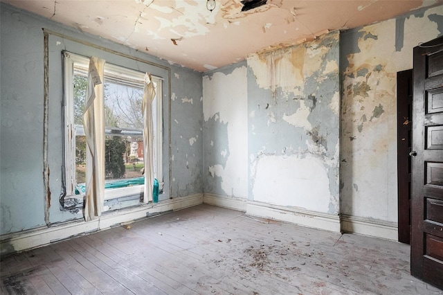 5169 Cates Ave, Saint Louis, MO 63108 - spare room featuring hardwood / wood-style floors