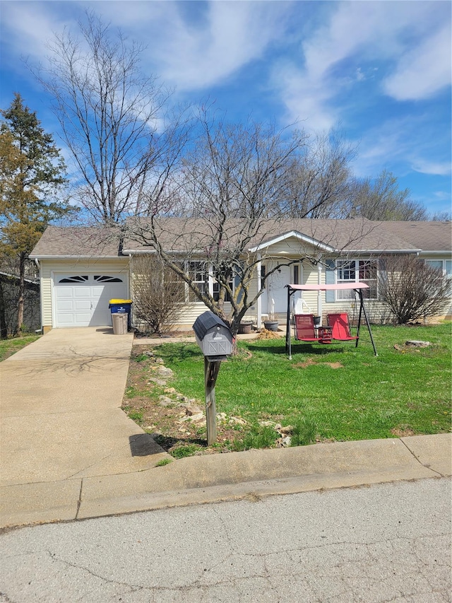 100 Grand Central Dr, Union, MO 63084 - view of front facade featuring concrete driveway, a front yard, and a garage