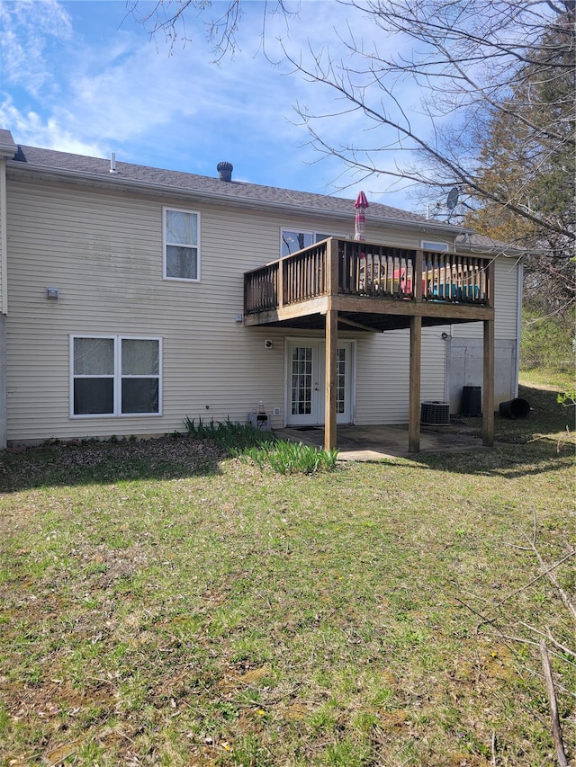 100 Grand Central Dr, Union, MO 63084 - rear view of property featuring a deck, a yard, central air condition unit, and a patio area