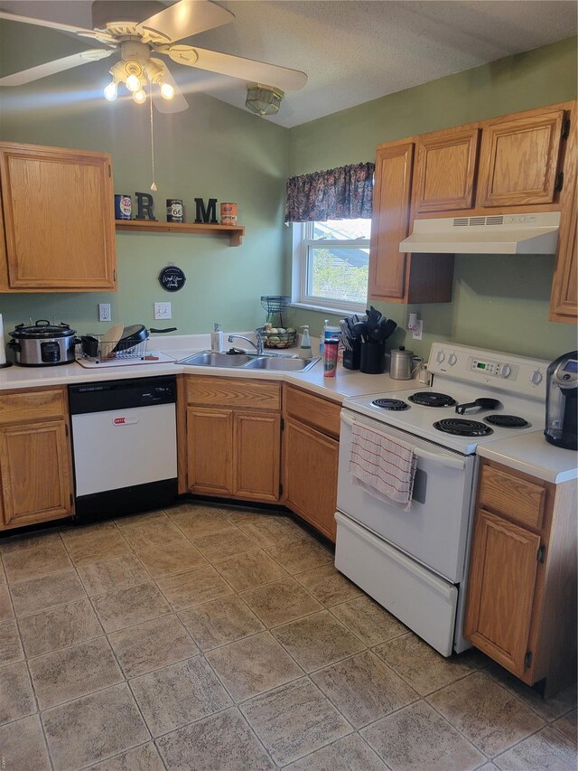 100 Grand Central Dr, Union, MO 63084 - kitchen with white appliances, under cabinet range hood, a sink, ceiling fan, and light countertops