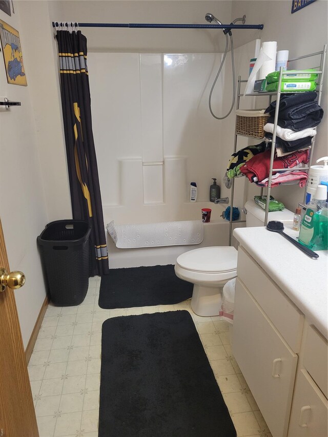 100 Grand Central Dr, Union, MO 63084 - bathroom featuring toilet, shower / tub combo with curtain, and tile patterned floors