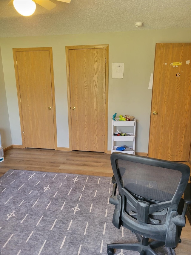 100 Grand Central Dr, Union, MO 63084 - office featuring wood finished floors and a textured ceiling