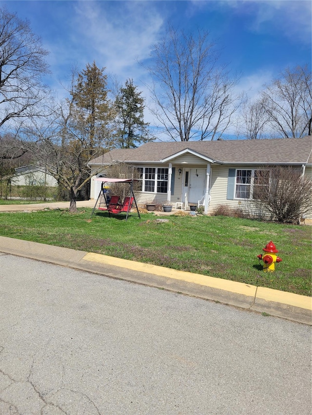 100 Grand Central Dr, Union, MO 63084 - view of front of home with a front lawn
