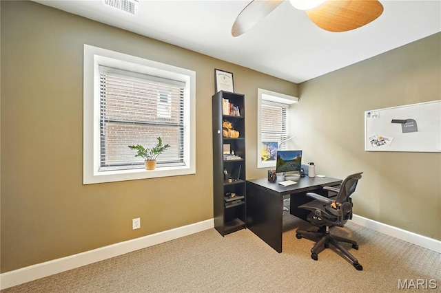 4228 Mcpherson Ave Unit 212, Saint Louis, MO 63108 - office featuring plenty of natural light, carpet, baseboards, and a ceiling fan