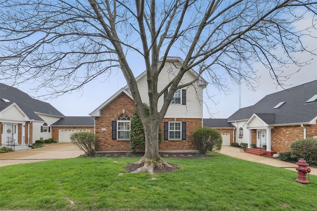 7426 Whitehall Colonial Ln, Saint Louis, MO 63119 - traditional-style house with brick siding, a front lawn, and driveway