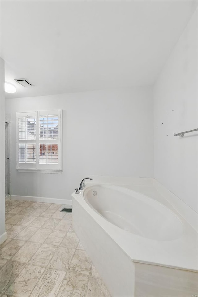 7426 Whitehall Colonial Ln, Saint Louis, MO 63119 - full bath featuring a bath, baseboards, and an enclosed shower