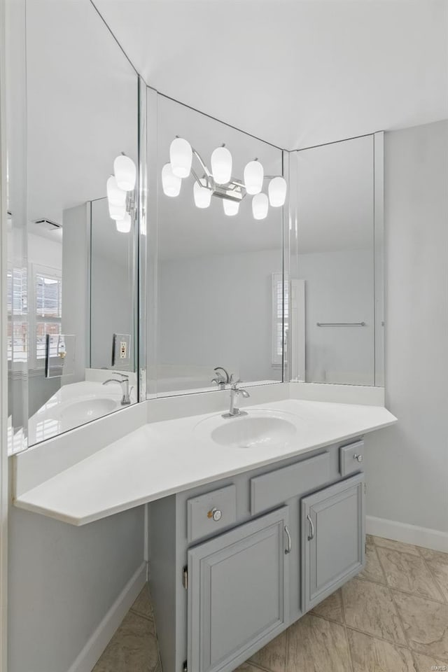 7426 Whitehall Colonial Ln, Saint Louis, MO 63119 - bathroom with vanity and baseboards
