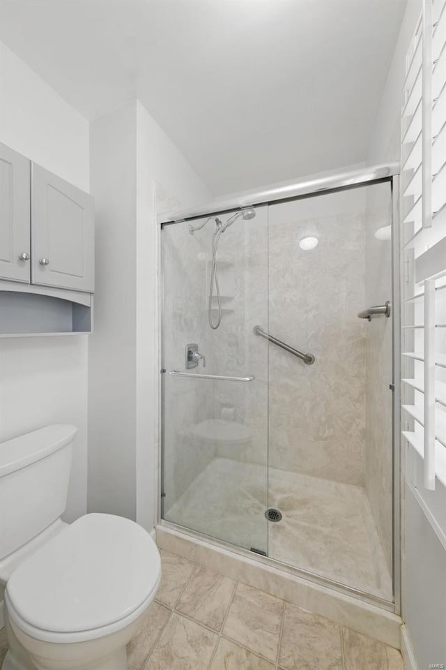 7426 Whitehall Colonial Ln, Saint Louis, MO 63119 - bathroom with toilet and a stall shower