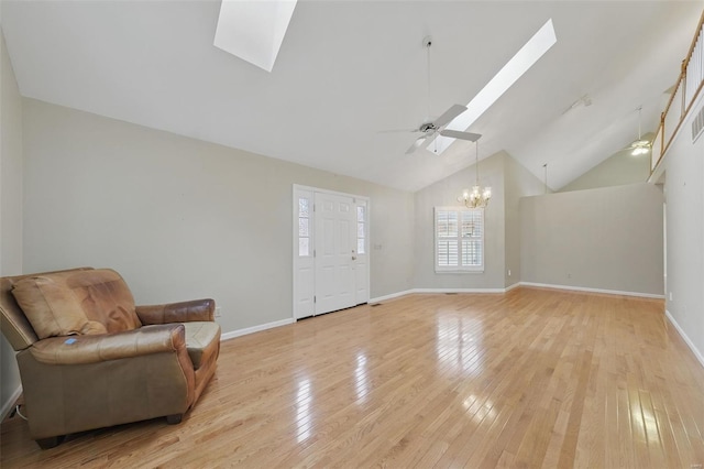 7426 Whitehall Colonial Ln, Saint Louis, MO 63119 - foyer with a skylight, a chandelier, ceiling fan, baseboards, and light wood finished floors