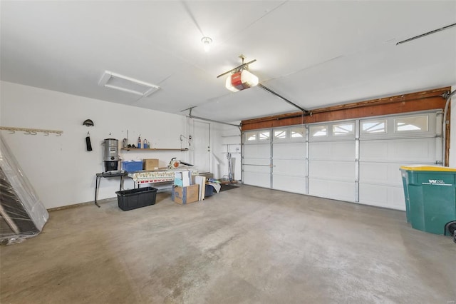 7426 Whitehall Colonial Ln, Saint Louis, MO 63119 - garage featuring a garage door opener and strapped water heater