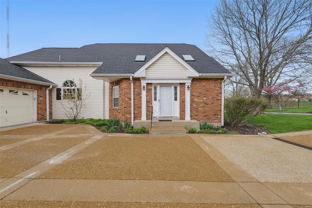 7426 Whitehall Colonial Ln, Saint Louis, MO 63119 - traditional-style house featuring brick siding, a garage, and roof with shingles