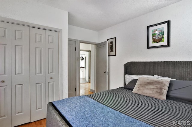 7414 Bruno Ave, Saint Louis, MO 63117 - bedroom with light wood finished floors and a closet