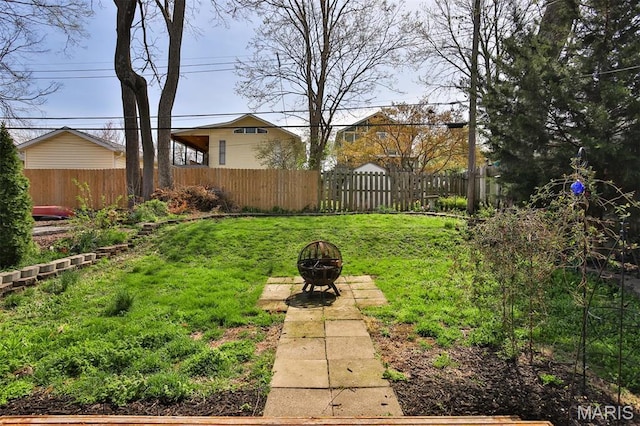 7414 Bruno Ave, Saint Louis, MO 63117 - view of yard with an outdoor fire pit