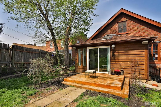 7414 Bruno Ave, Saint Louis, MO 63117 - back of house featuring fence and a wooden deck