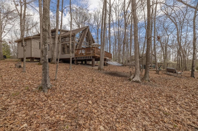 view of yard with a deck