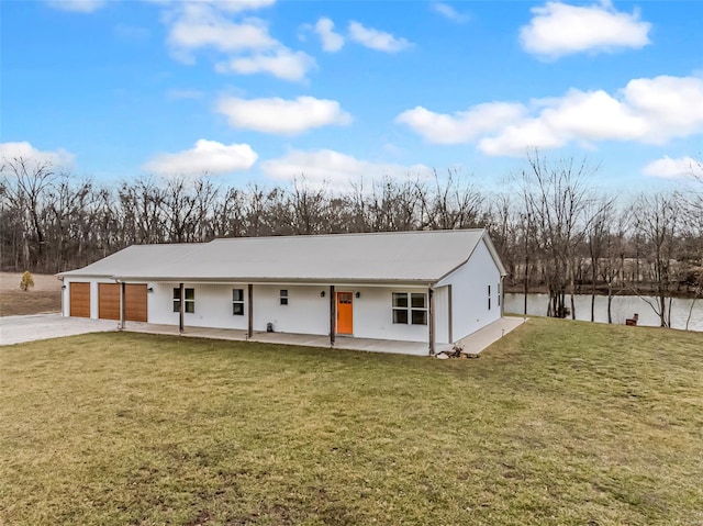 55 Big Lead Creek Ln, Silex, MO 63377 - view of front of house with driveway, a front yard, an attached garage, a water view, and view of wooded area