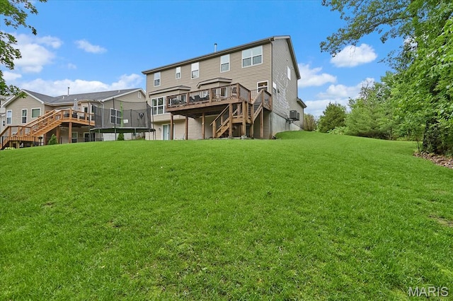 472 Cypress Creek Ln, Imperial, MO 63052 - back of property featuring stairs, a wooden deck, and a lawn