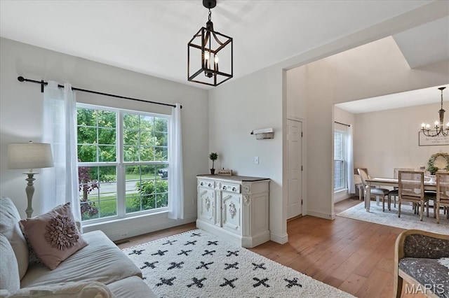 472 Cypress Creek Ln, Imperial, MO 63052 - entryway featuring a chandelier, light wood-type flooring, and baseboards