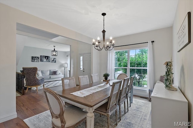 472 Cypress Creek Ln, Imperial, MO 63052 - dining area featuring a chandelier and light wood-style flooring