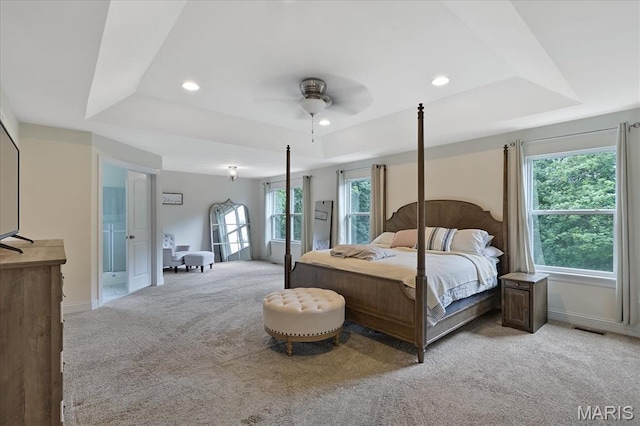472 Cypress Creek Ln, Imperial, MO 63052 - bedroom featuring a tray ceiling, light carpet, baseboards, recessed lighting, and ceiling fan